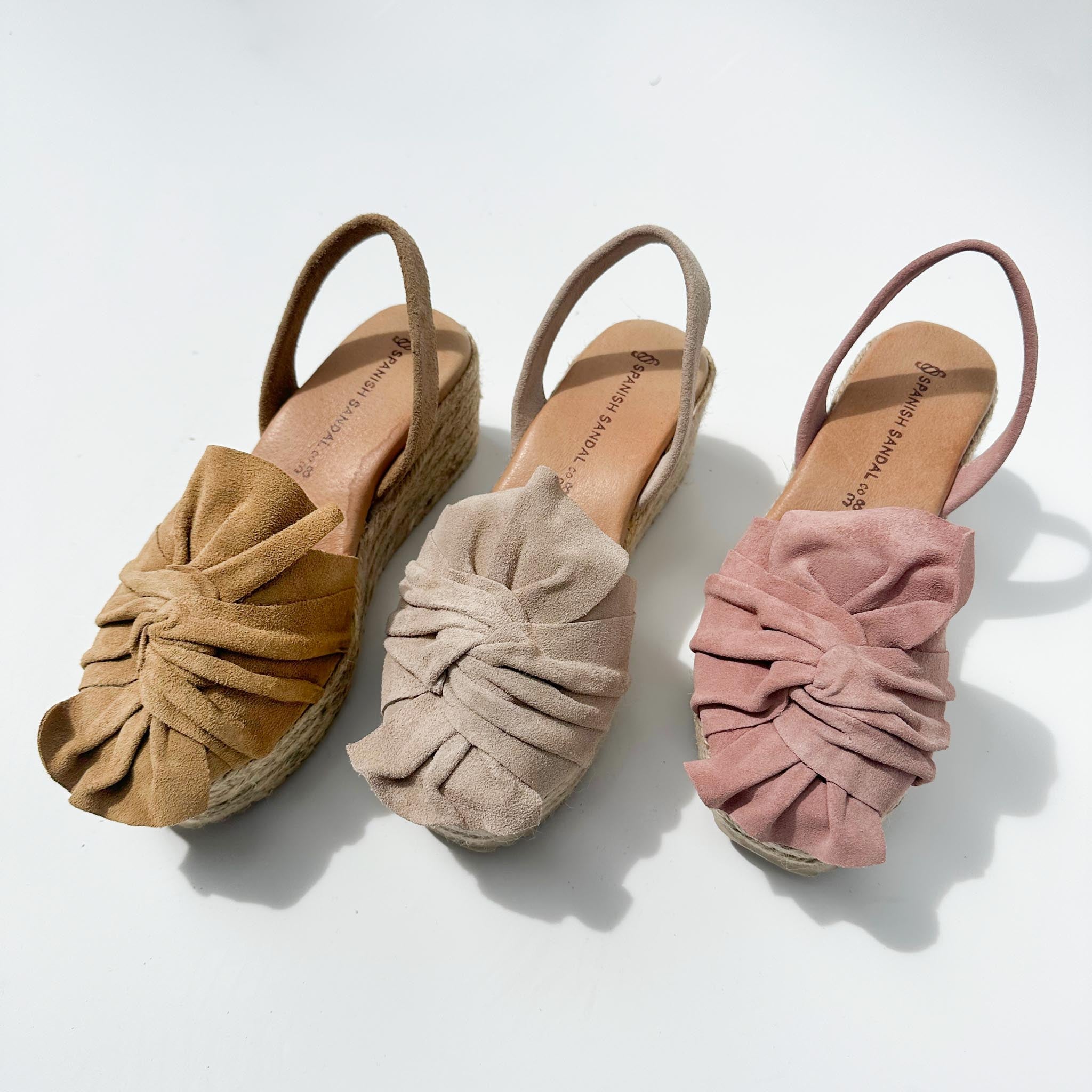Soft pink ruffle platform sandals