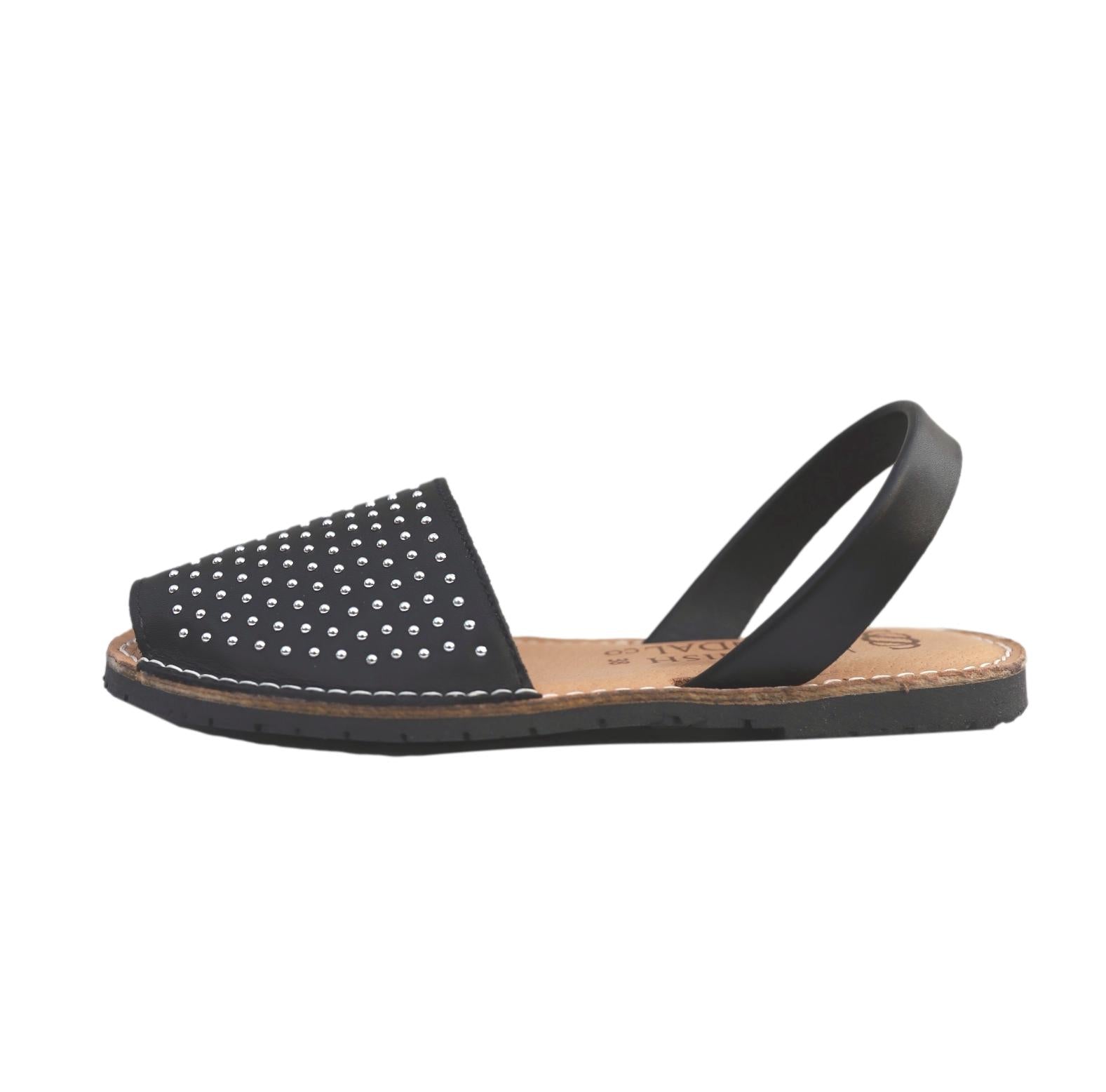 black studded sandals - profile view