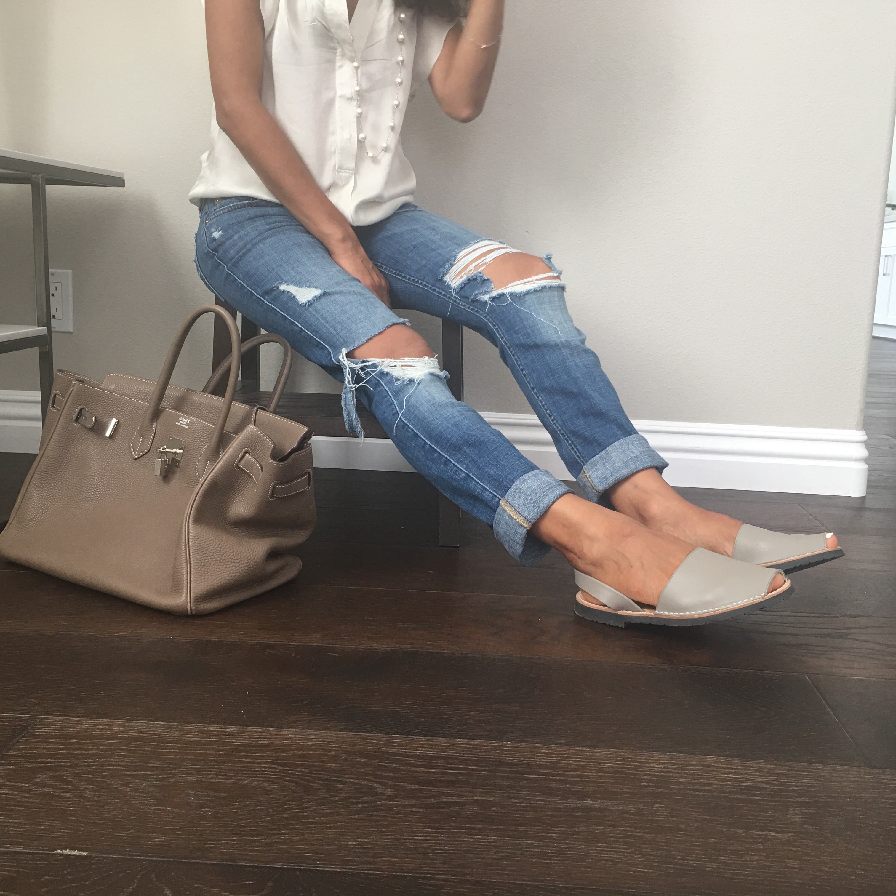 Classic taupe sandals with distressed jeans - Instagram