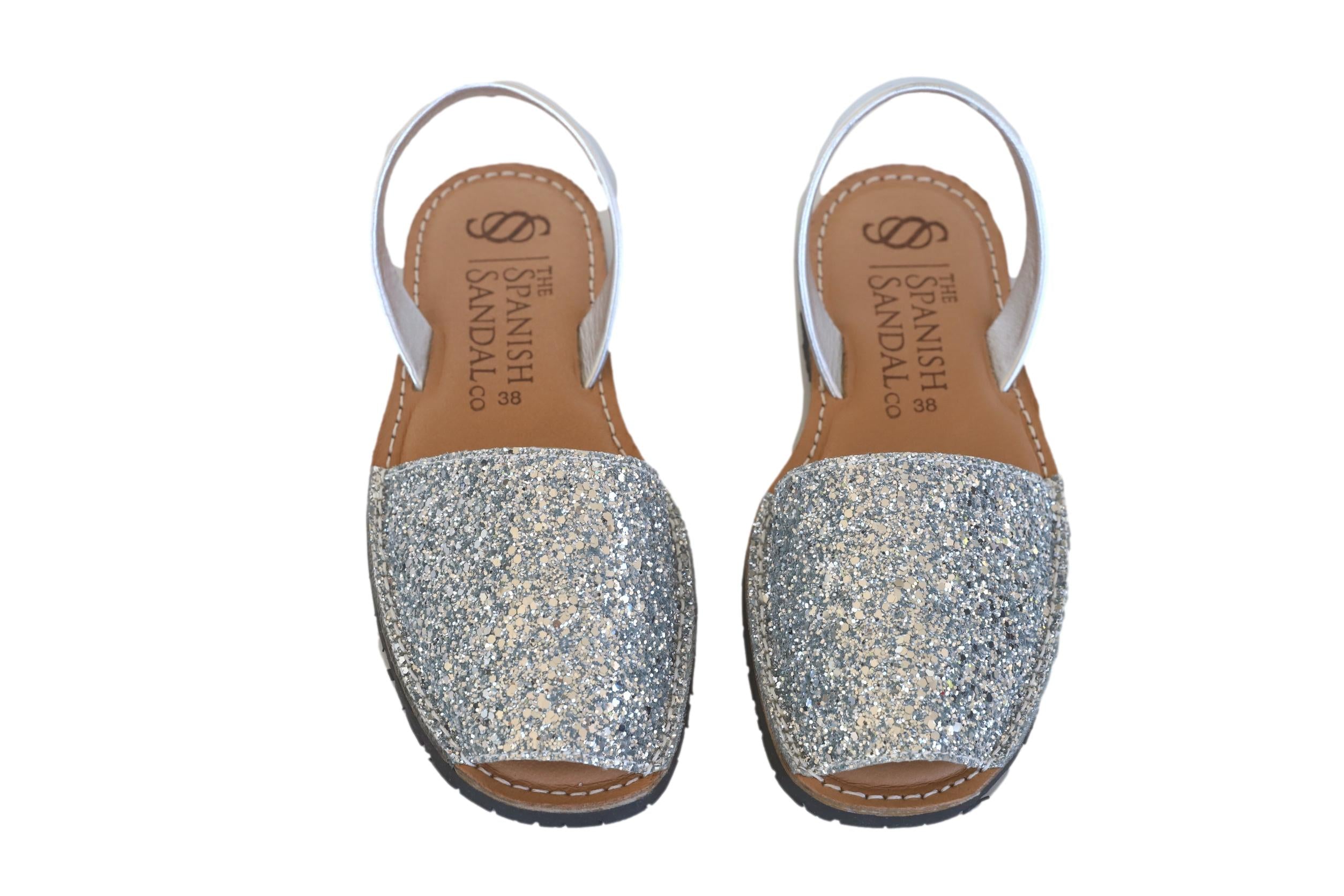 front facing classic sandals in glitter silver