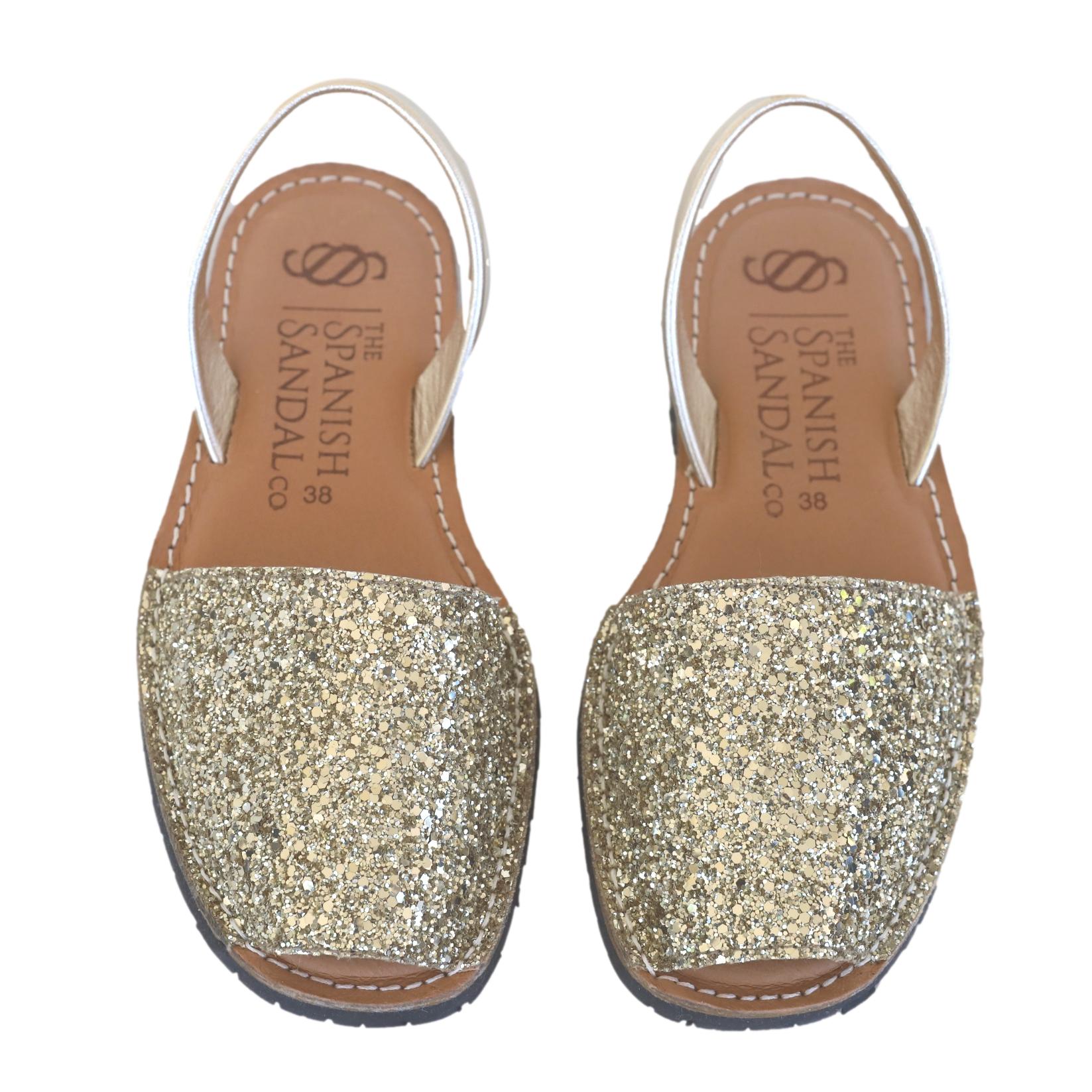front facing classic sandals in glitter gold
