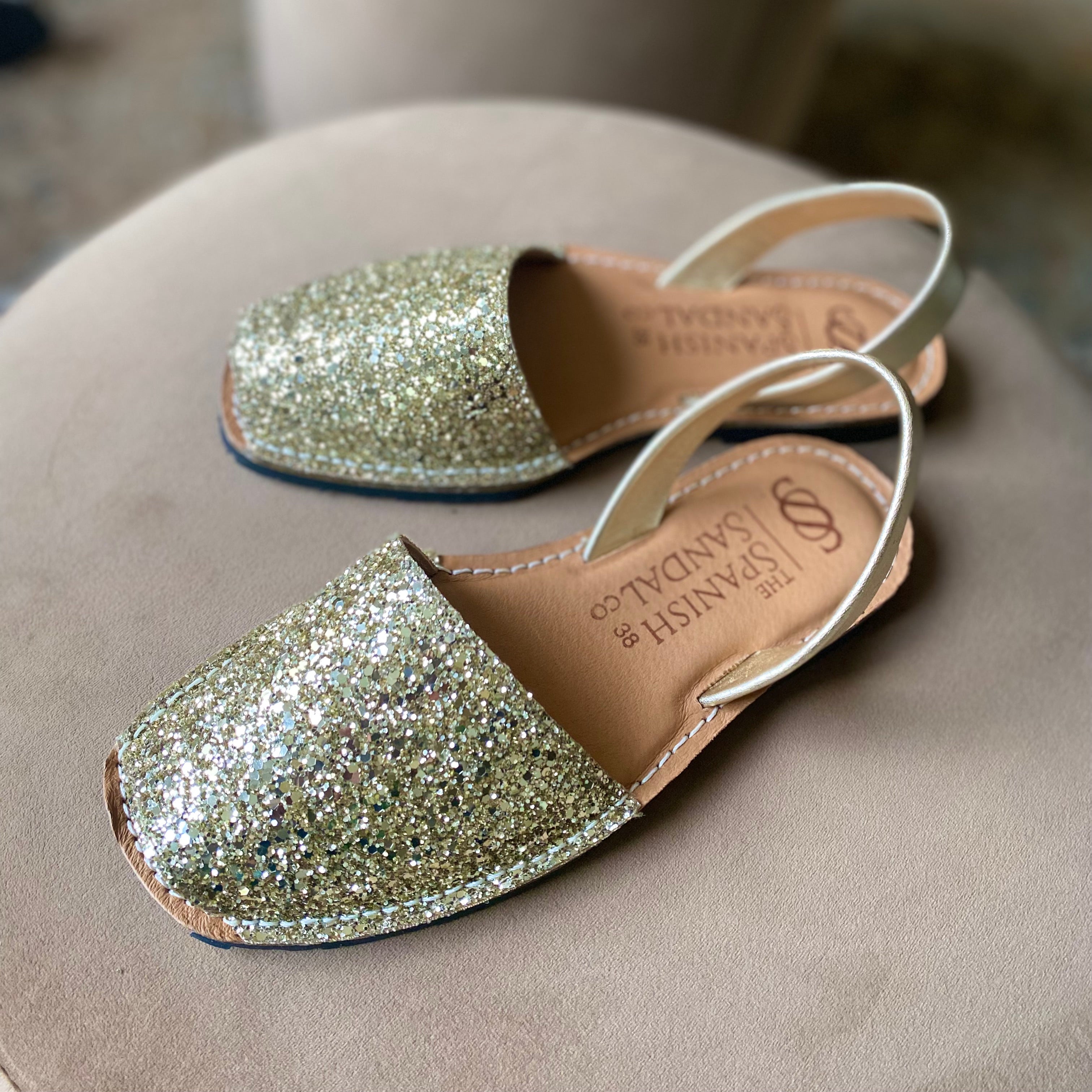 Gold sparkly flat sandals